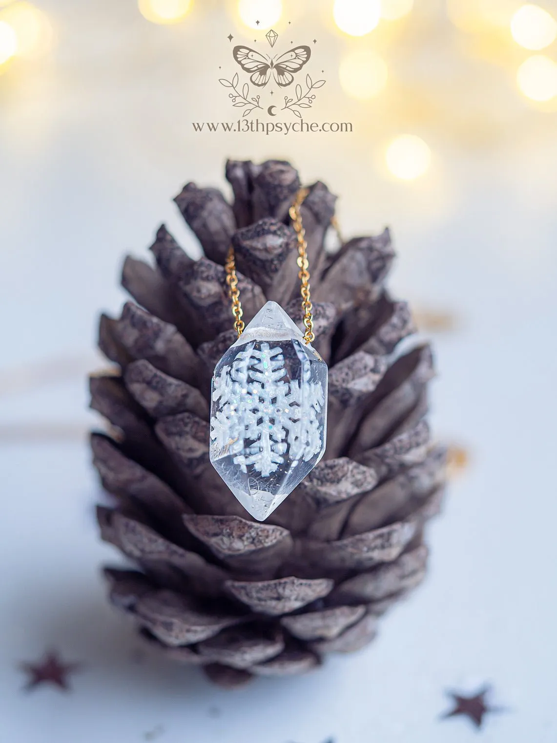 Encased snowflake crystal point pendant necklace